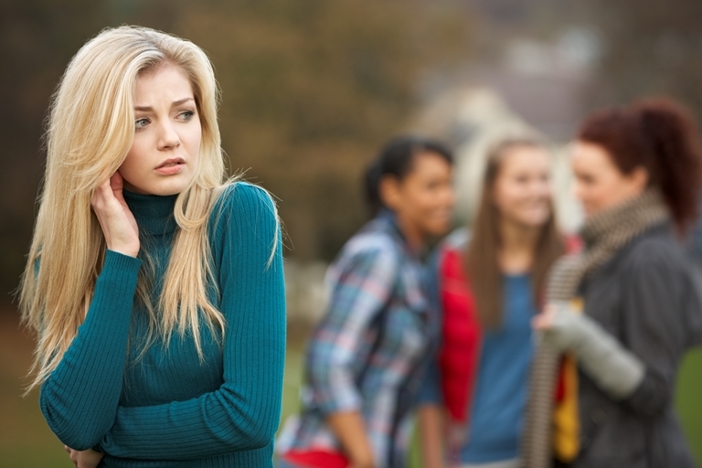 Woman experiencing social anxiety with support available through TMS Therapy for Anxiety in Orange County